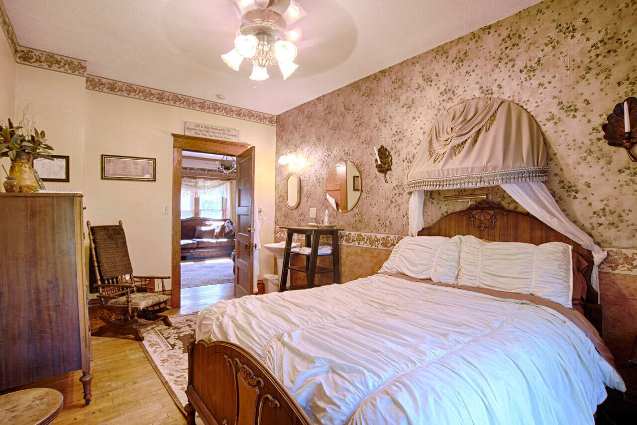 Antique bedroom with canopy bed.