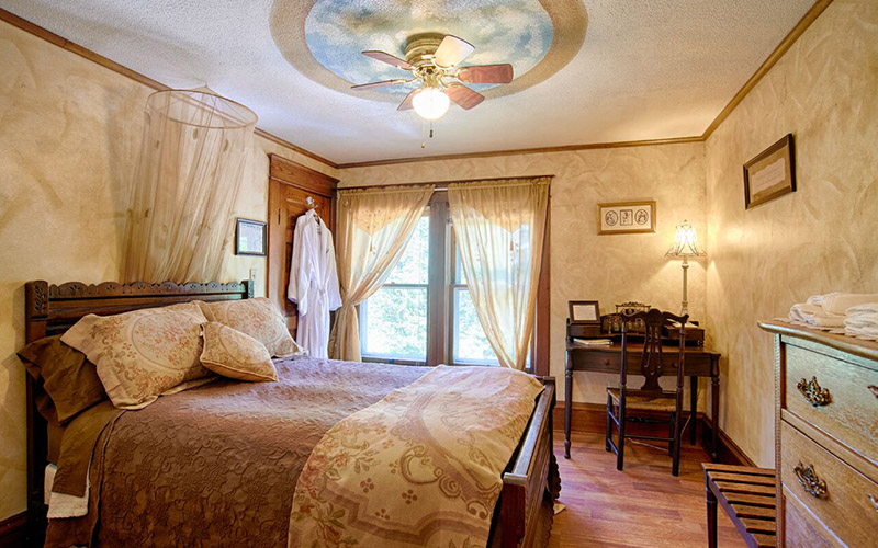 Cozy bedroom with antique furniture.